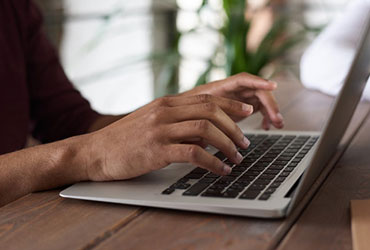 Services person using macbook